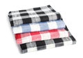 Folded checkered kitchen towels on white