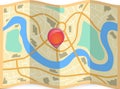 Folded city map with pin on it