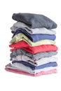 Folded Clean Clothes in a Pile on White Background Royalty Free Stock Photo