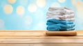 Folded Clothes on a Wooden Table Royalty Free Stock Photo