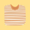 Folded colorful striped t-shirt on yellow background.