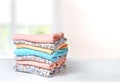 Folded cotton clothes stack on table empty background Royalty Free Stock Photo