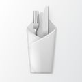 Folded Envelope Napkin with Silver Fork and Knife. Table Setting