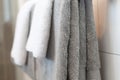 Folded gray and white towels.