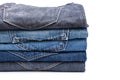 Folded jean stack on white background Royalty Free Stock Photo