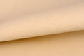 Folded Light Beige Artificial Leather Background Royalty Free Stock Photo