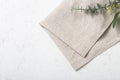 Folded linen napkin on marble table Royalty Free Stock Photo
