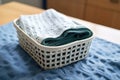 folded microfiber cleaning cloth in a laundry basket Royalty Free Stock Photo