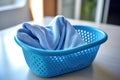 folded microfiber cleaning cloth in a laundry basket Royalty Free Stock Photo