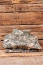 Folded military clothes.