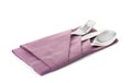 Folded napkin with fork, spoon and knife Royalty Free Stock Photo