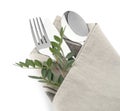 Folded napkin with fork, spoon and knife Royalty Free Stock Photo