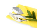 Folded napkin with fork, spoon and knife on white background Royalty Free Stock Photo