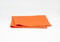 Folded orange napkin