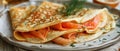 Folded pancakes with smoked salmon on the plate. Horizontal banner 7:3