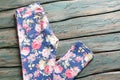 Folded pants with flower print. Royalty Free Stock Photo