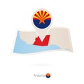 Folded paper map of Arizona U.S. State with flag pin of Arizona Royalty Free Stock Photo