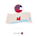 Folded paper map of Mississippi U.S. State with flag pin of Mississippi Royalty Free Stock Photo