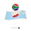 Folded paper map of South Africa with flag pin of South Africa Royalty Free Stock Photo