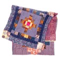 Folded patchwork scarf from purple silk fabrics Royalty Free Stock Photo