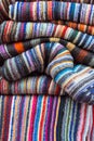 A folded pile of colorful cloth