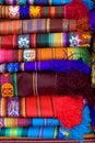 A folded pile of colorful cloth