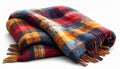 Folded Plaid Blanket With Red Blue and Yellow Colors on White Background Royalty Free Stock Photo