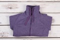 Folded purple track jacket