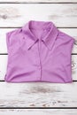 Folded purple women shirt.