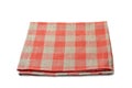 Folded red-checkered textile napkin on white background Royalty Free Stock Photo