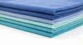 Stack of microfiber cloths in varying shades of blue and teal. Each cloth is neatly Royalty Free Stock Photo