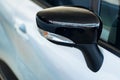 Folded side mirror of modern black car Royalty Free Stock Photo