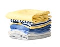 Folded stack clothes isolated on white.