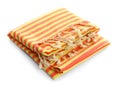 Folded striped beach towel isolated on white Royalty Free Stock Photo