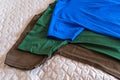 Folded t-shirts different colours. T-shirt sleeves