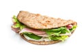 Folded wholemeal flatbread with ham and vegetables isolated on white Royalty Free Stock Photo