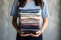 Colorful woman folded laundry clean textile background cloth stack cotton fashion material background pile fabric