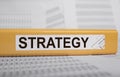 Folder with business strategy word, inscription. Strategic plan Royalty Free Stock Photo
