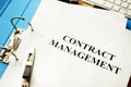 Folder and documents with contract management. Royalty Free Stock Photo