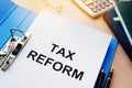 Folder and documents about Tax reform. Royalty Free Stock Photo