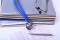 Folder file and stethoscope on the desk Royalty Free Stock Photo