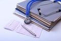 Folder file and stethoscope on the desk Royalty Free Stock Photo