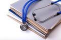 Folder file and stethoscope on the desk Royalty Free Stock Photo