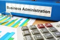 Folder with label business administration.