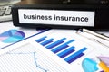 Folder with the label business insurance Royalty Free Stock Photo