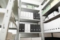 Folders and boxes with documents on shelves in archive