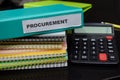 Folders with the label procurement. Business management concept Royalty Free Stock Photo