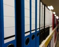 Folders for papers stand in a row Royalty Free Stock Photo