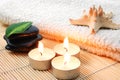 Foldet white bath towel and zen stones Royalty Free Stock Photo