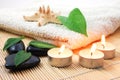 Foldet white bath towel and zen stones Royalty Free Stock Photo